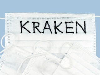 White protective face masks, one with word KRAKEN. Omicron subvariant XBB.1.5, covid-19. Medical concept