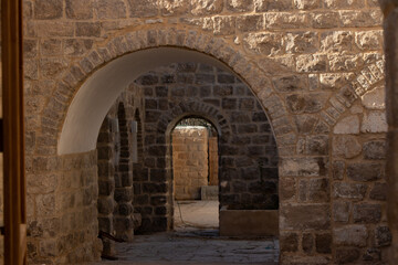 Fototapeta na wymiar Old caravanserai in Judaean desert in Palestine region. Maqam Nabi Musa
