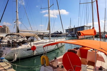 Modern yachts in sea at pier