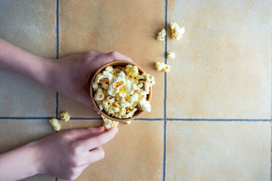 Paper cup with popcorn snack