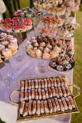 buffet table with sweet from above at outside