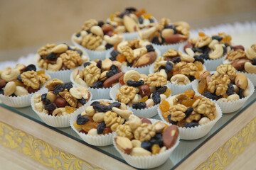 Composition dried fruits and assorted nuts.