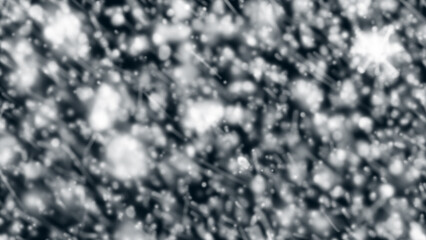 The texture of a heavy snowfall on a dark background.