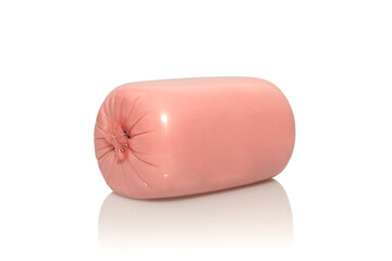 A loaf of delicious pink ham sausage. A savory snack for breakfast.