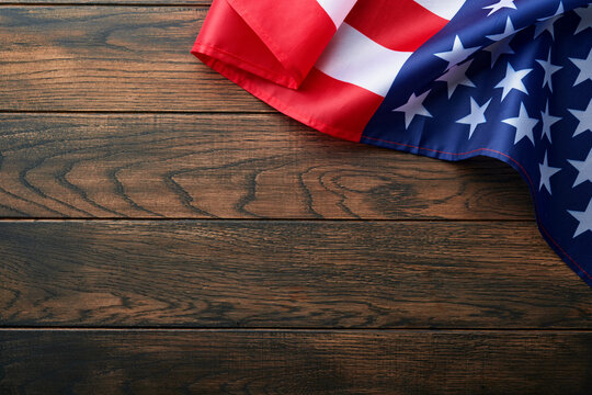 American flag on old wooden background with copy space. Close Up for Memorial Day or 4th of July or Happy Martin Luther King jr day. Top view. Copy space. Mock up.