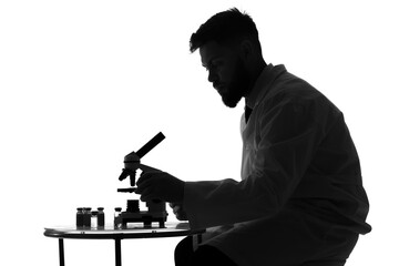 Silhouette of male scientist working with microscope on white background