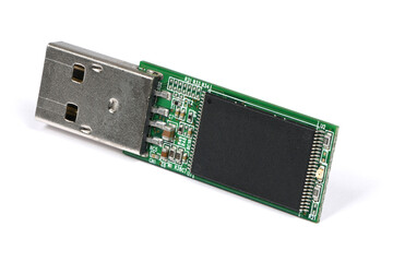 Disassembled flash drive on a white background.