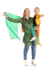 Beautiful woman with her little son and flag of Ireland on white background