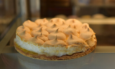 Meringue cake on a wooden board