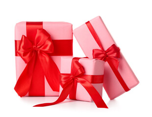 Pink gift boxes with red ribbon on white background. Valentine's Day celebration