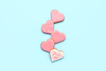 Composition with sweet heart shaped cookies on color background. Valentine's Day celebration