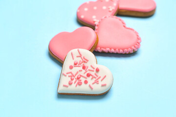 Obraz premium Composition with sweet heart shaped cookies on color background. Valentine's Day celebration