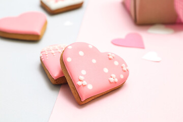 Tasty heart shaped cookies on color background. Valentine's Day celebration