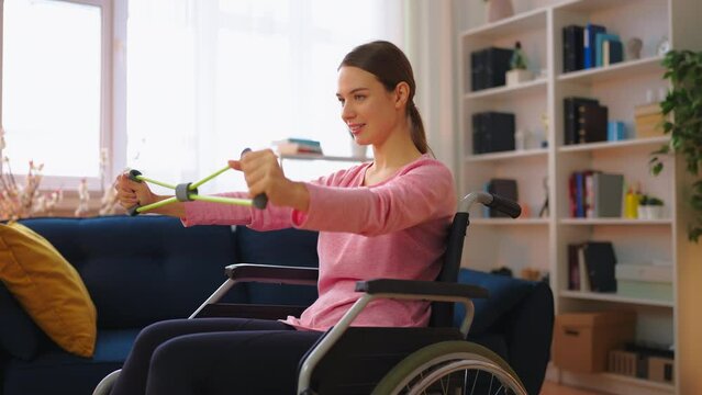 Young woman with disability doing stretching exercises at home, sports, hobby