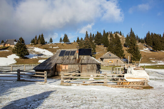 Velika planina mountain 1666 m in Kamnik Savinja Alps in Slovenia, winter hiking in herdsmen&rsquo;s huts village covered with snow