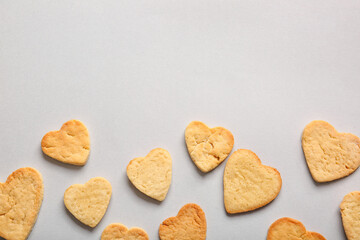 Delicious heart shaped cookies on light background. Valentines Day celebration