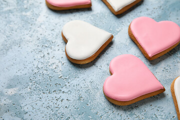 Heart shaped cookies on blue grunge background, closeup. Valentines Day celebration