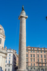 Fototapeta na wymiar Trajan Column (Colonna Traiana). Roman triumphal column in Rome, Italy.