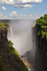 The iconic Victoria Falls,  Mosi-Oa-Tunya waterfall, view from the Zimbabwe side.