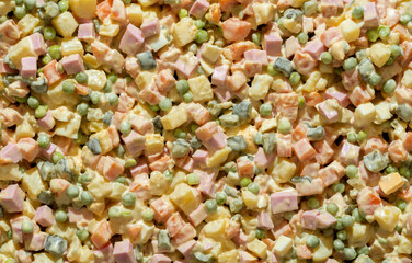 Olivier salad background full frame, above view.