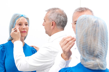 Doctor using a clinical marker before a acid hyaluronic injection