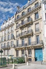 Fototapeta premium Paris, typical facade boulevard Magenta, beautiful building, with old zinc roofs 