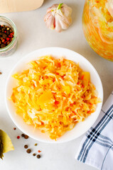 Sauerkraut, Shredded cabbage, apples, and carrots on bright rustic background, Fermented Food, Healthy Eating