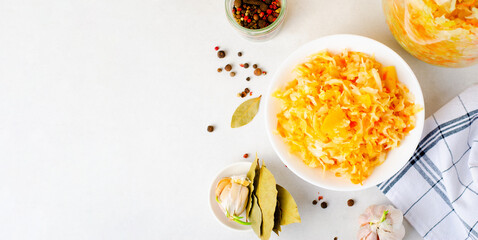 Sauerkraut, Shredded cabbage, apples, and carrots on bright rustic background, Fermented Food, Healthy Eating
