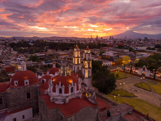 Puebla at Dramatic evening Sunset aerial drone shot of City Center in Puebla de Zaragoza, Puebla...
