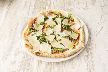 Ham, arugula and Parmesan cheese pizza recipe