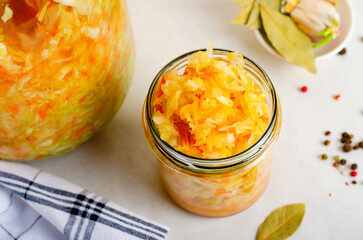 Sauerkraut, Shredded cabbage, apples, and carrots on bright rustic background, Fermented Food, Healthy Eating