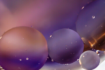 Bubbles of oil in the water. Balloons, eyes, balls, colors.
Abstraction - Cosmos - Planets.