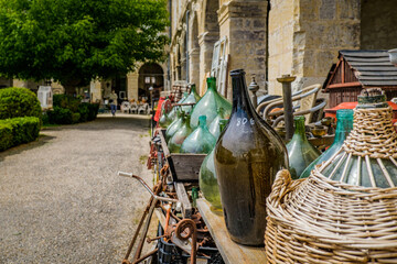 The village of antique dealers, a sort of flea market located in an old palace in Lectoure, in the...