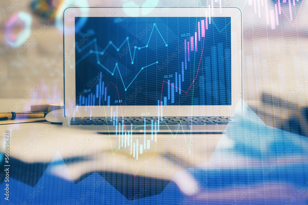 Aufkleber Financial graph colorful drawing and table with computer on background. Double exposure. Concept of international markets.