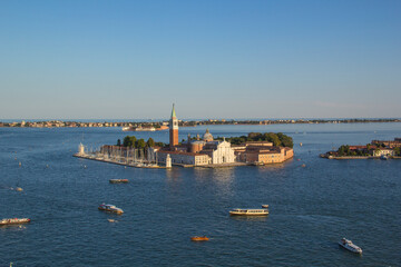 Beautiful view of the gondolas and the Cathedral of San Giorgio Maggiore, on an island in the Venetian lagoon, Venice, Italy