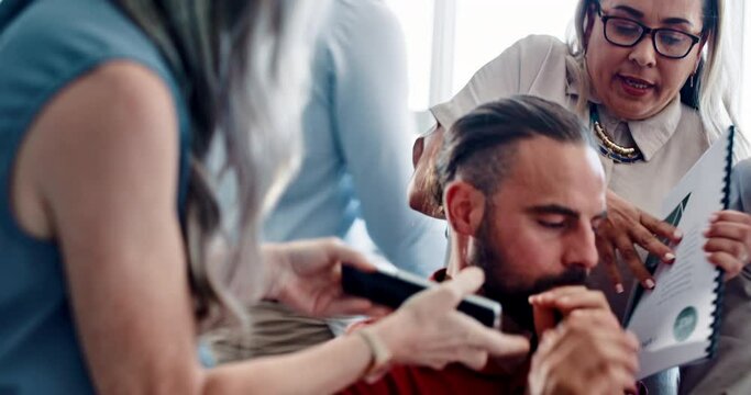 Overworked, overwhelmed and multitasking with an unhappy business man feeling pressure from his team with documents and a phone. Compliance, review or headache with frustrated male employee and team