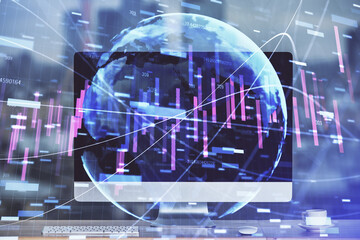 Financial graph colorful drawing and table with computer on background. Double exposure. Concept of international markets.