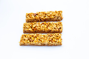 Peanuts butter chocolate bars on white