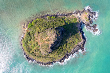 Direct overhead view of Chinaman's Hat, officially Mokolii Island, on the east coast of Oahu, Hawaii