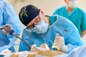 plastic surgeon in the operating room