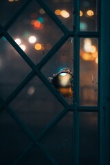 Broken Dreams: A Blurred Image of a Broken Window