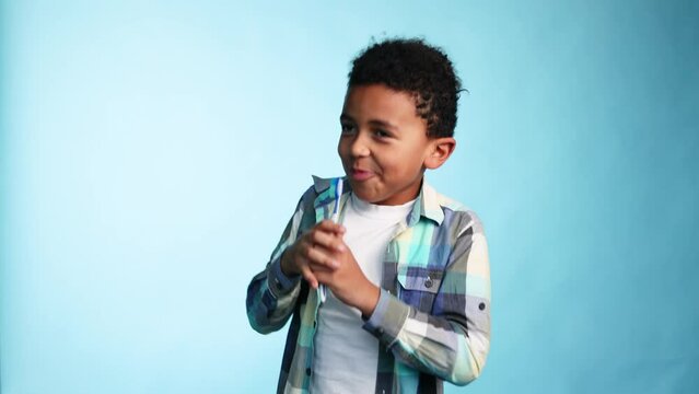 Cute Little African American Boy With Teeth Brush Having Fun And Singing Like With Microphone On Isolated Blue Background Adorable Kid Motivate Other Brushing Teeth Daily Healthcare Concept