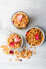 Granola with Dried Berries on Bright Concrete Background, Healthy Vegan Snack or Breakfast