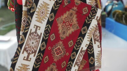 Details of traditional Turkish carpet in Istanbul shop, Turkey. Close up of Middle Eastern Arabian carpets in market store.