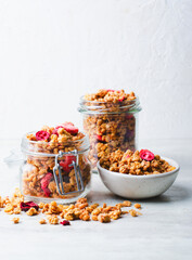 Granola with Dried Berries on Bright Concrete Background, Healthy Vegan Snack or Breakfast