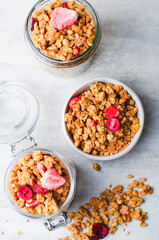 Granola with Dried Berries on Bright Concrete Background, Healthy Vegan Snack or Breakfast