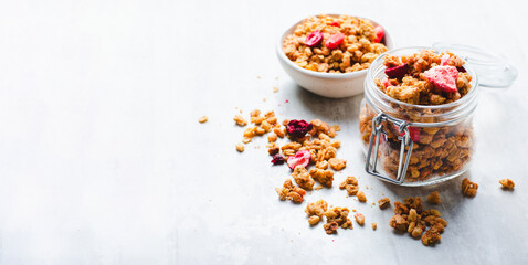 Granola with Dried Berries on Bright Concrete Background, Healthy Vegan Snack or Breakfast