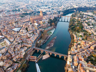 View from drone of town of Albi, Tarn river and Sainte-Cecile cathedral, France