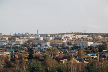Fototapeta premium View of a small town, surrounded by forest and nature. City landscape.