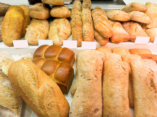 Choosing food from shelf in supermarket,bakery,Grocery stores